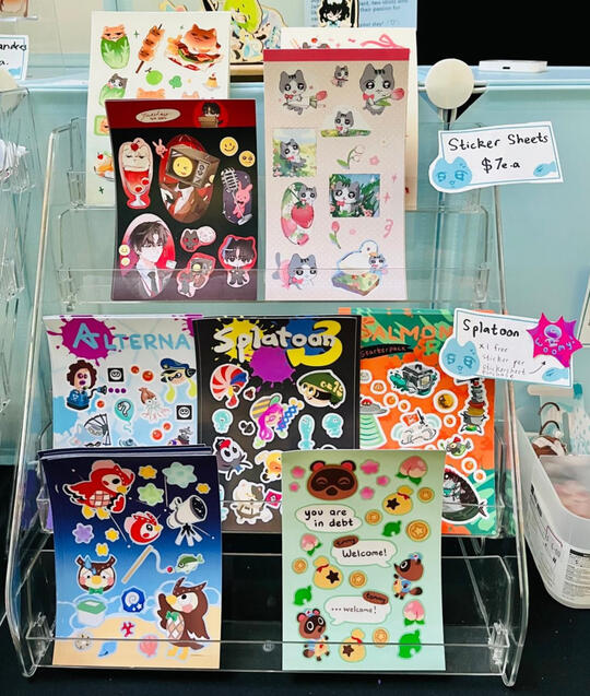 Sticker sheet stand